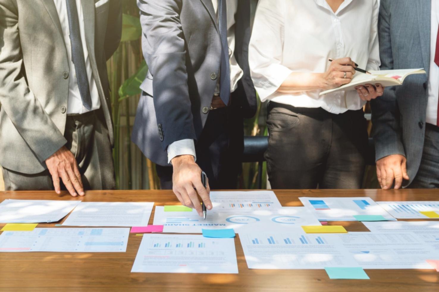 Professional analyzing financial data and market trends